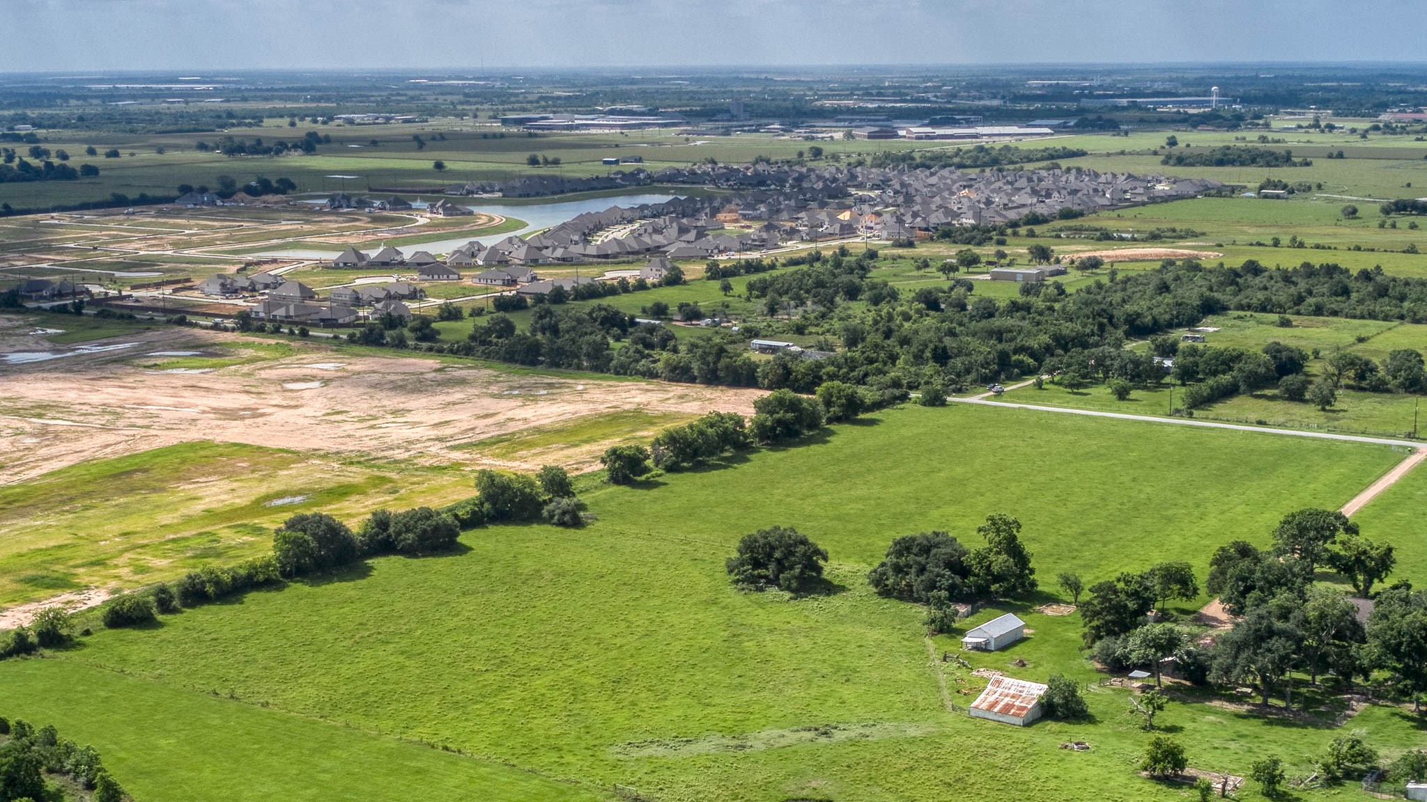 32626 Knebel Road Waller, TX 77484 - Photo 7 of 21 a view of a lake with a yard