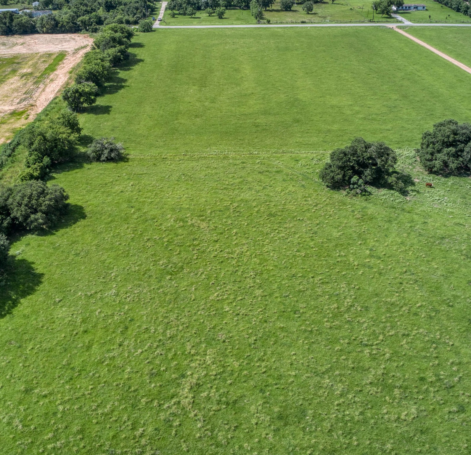 32626 Knebel Road Waller, TX 77484 - Photo 10 of 21 a view of a golf course with a lake