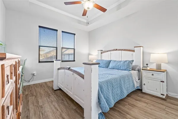 a bed room with a bed and a window