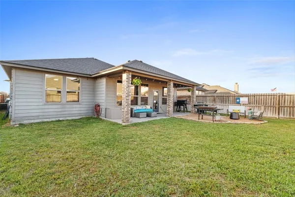 a house view with a garden space