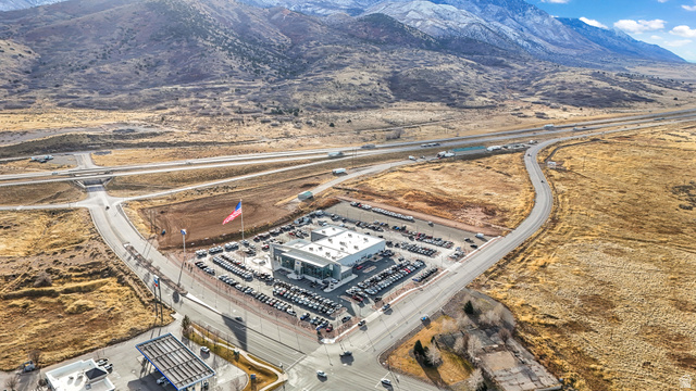 15371 Frontage Road Santaquin, UT 84655 - Photo 4 of 18 Aerial view of property and surrounding area featuring mountains