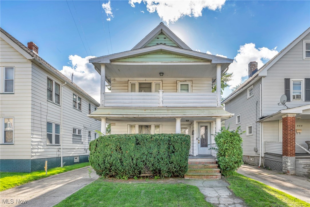 872 Rondel Road Cleveland, OH 44110 - Photo 2 of 25 View of front of property featuring a porch