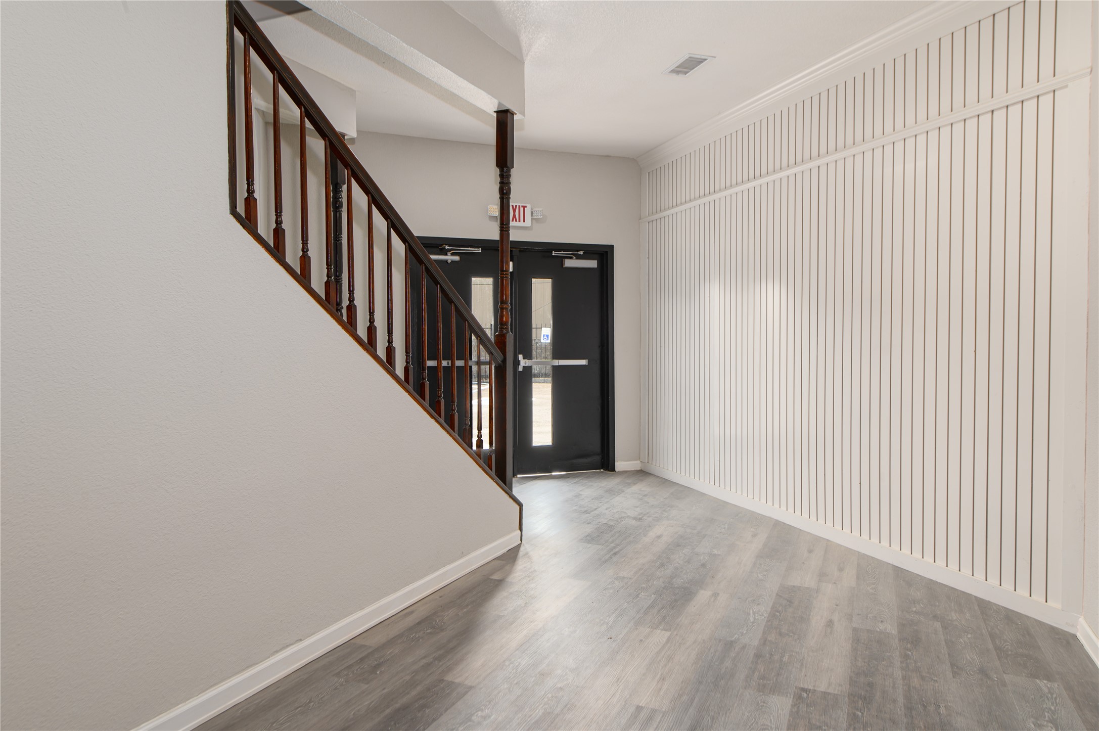 4705 Lyons Avenue, Unit 1 Houston, TX 77020 - Photo 12 of 19 a view of a hallway with staircase