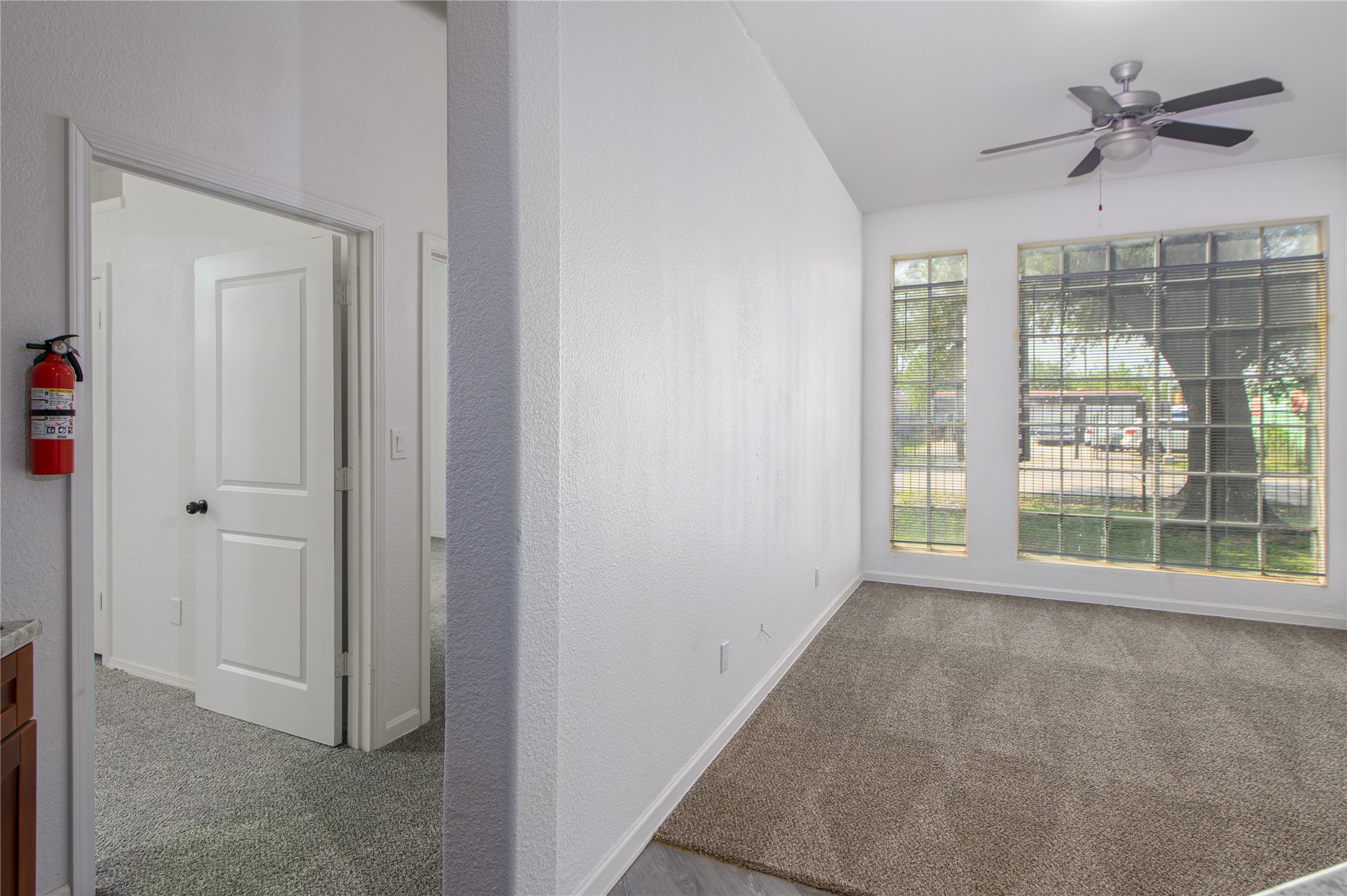 4705 Lyons Avenue, Unit 1 Houston, TX 77020 - Photo 2 of 19 a view of room with window and ceiling fan