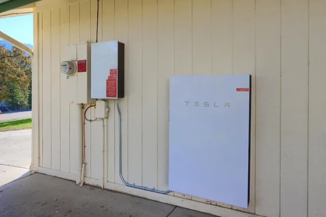 a bathroom with a shower and a door