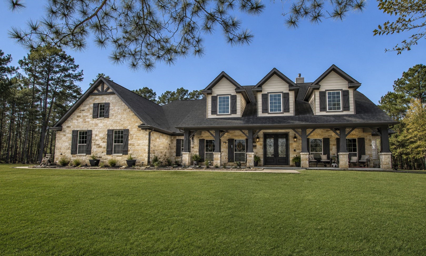1142 Fletcher Anderson, TX 77830 - Photo 3 of 48 This image is a visualization of what the exterior might look like with the trim, columns and beams painted
charcoal to match the new roof