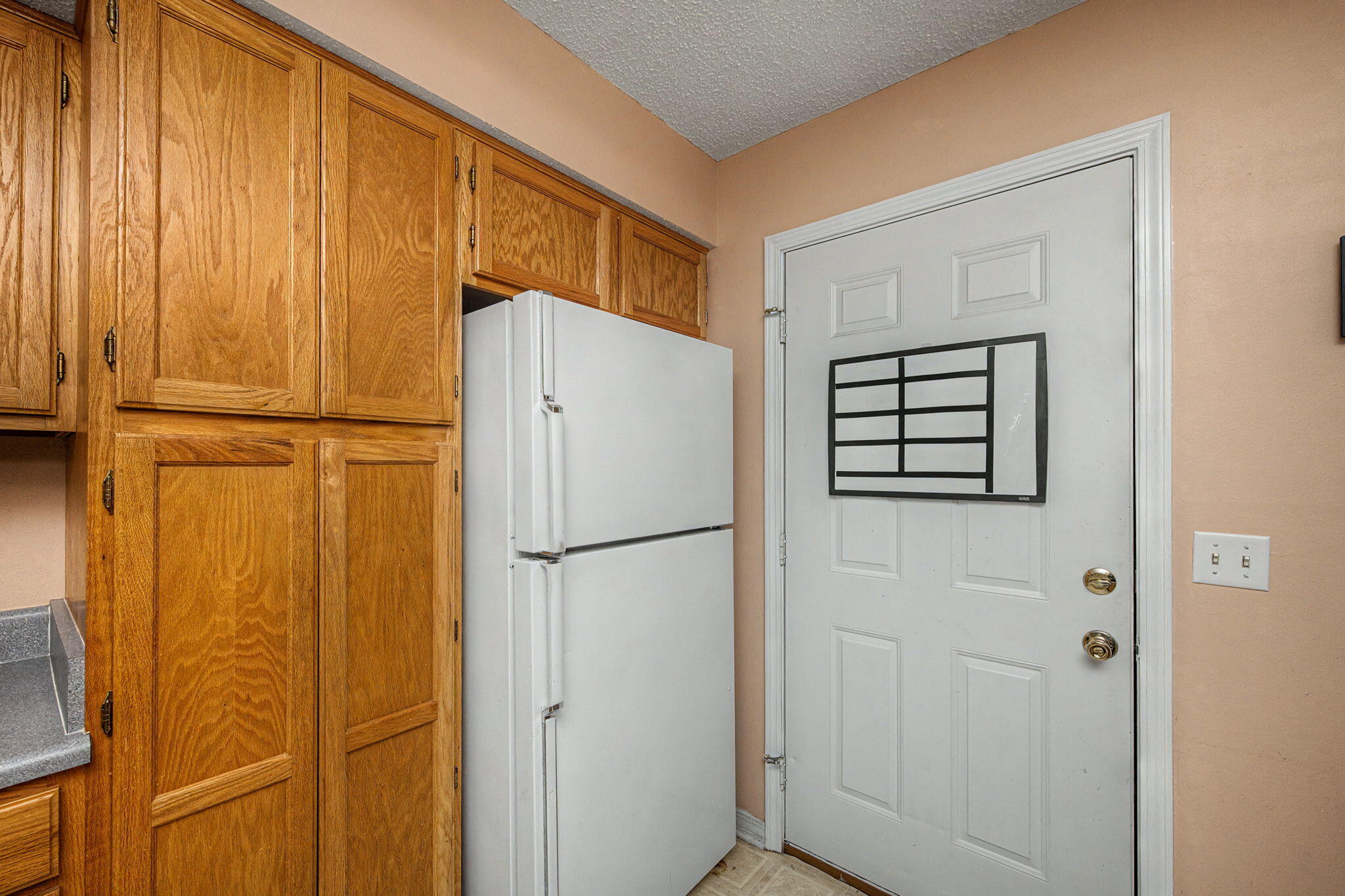223 Runnymeade Drive Crestview, FL 32539 - Photo 15 of 38 a white refrigerator freezer and a dishwasher