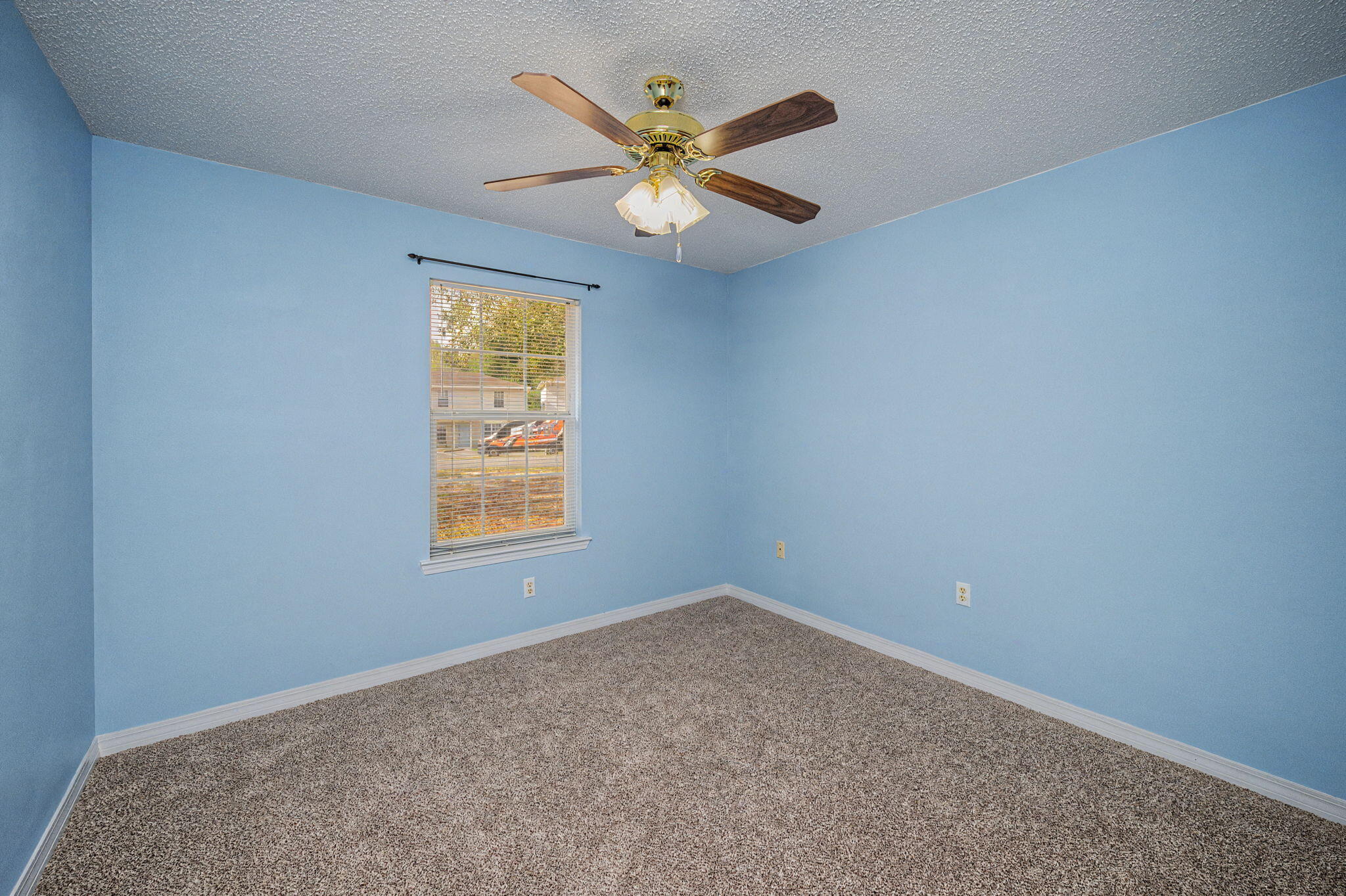 223 Runnymeade Drive Crestview, FL 32539 - Photo 18 of 38 an empty room with a window