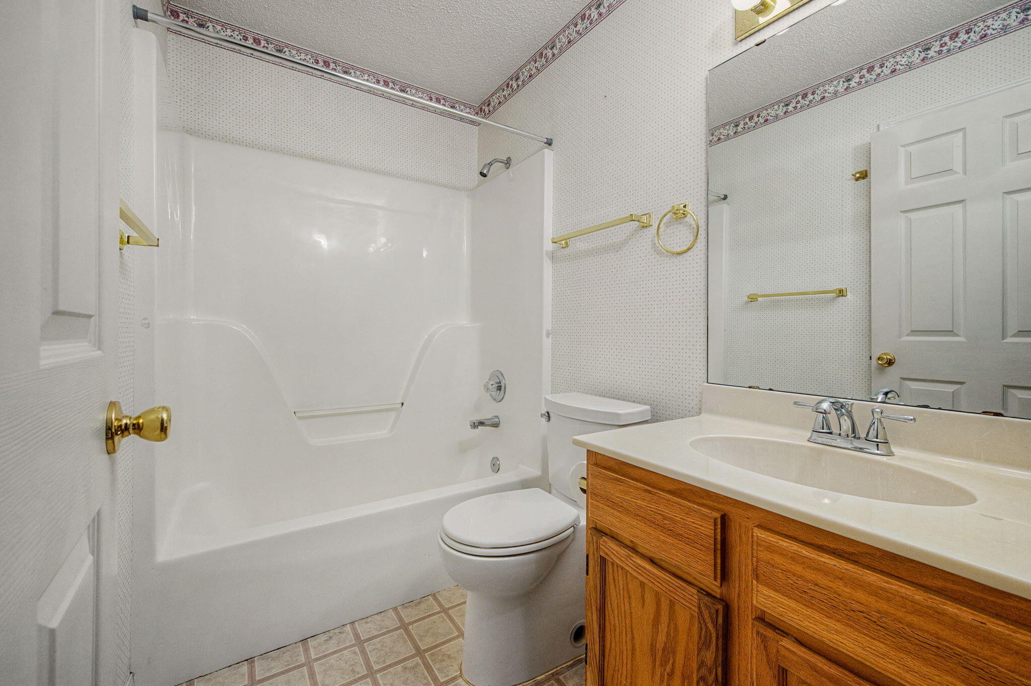 223 Runnymeade Drive Crestview, FL 32539 - Photo 21 of 38 a bathroom with a sink a toilet and shower