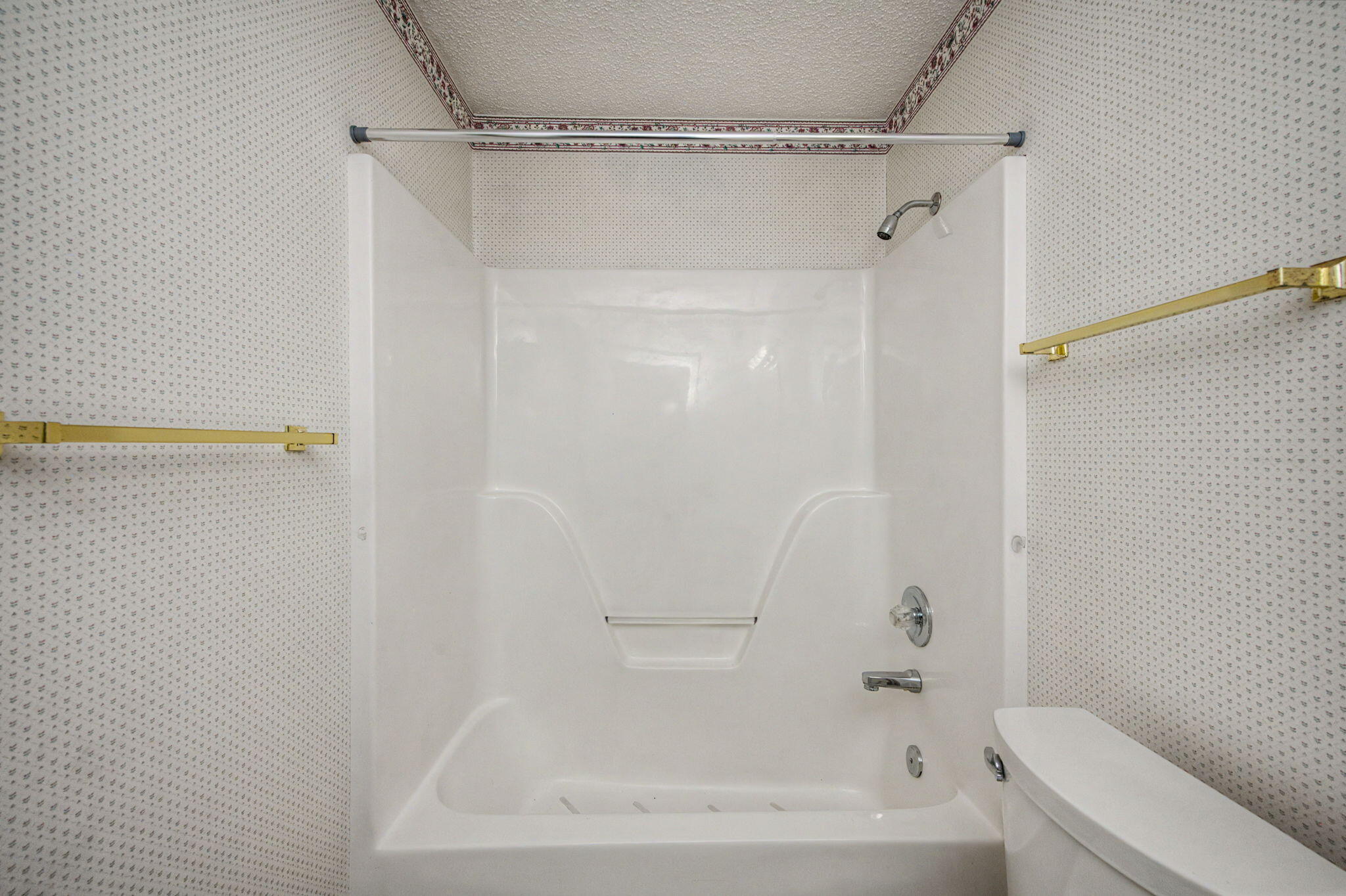 223 Runnymeade Drive Crestview, FL 32539 - Photo 22 of 38 a bathroom with a bathtub and a shower