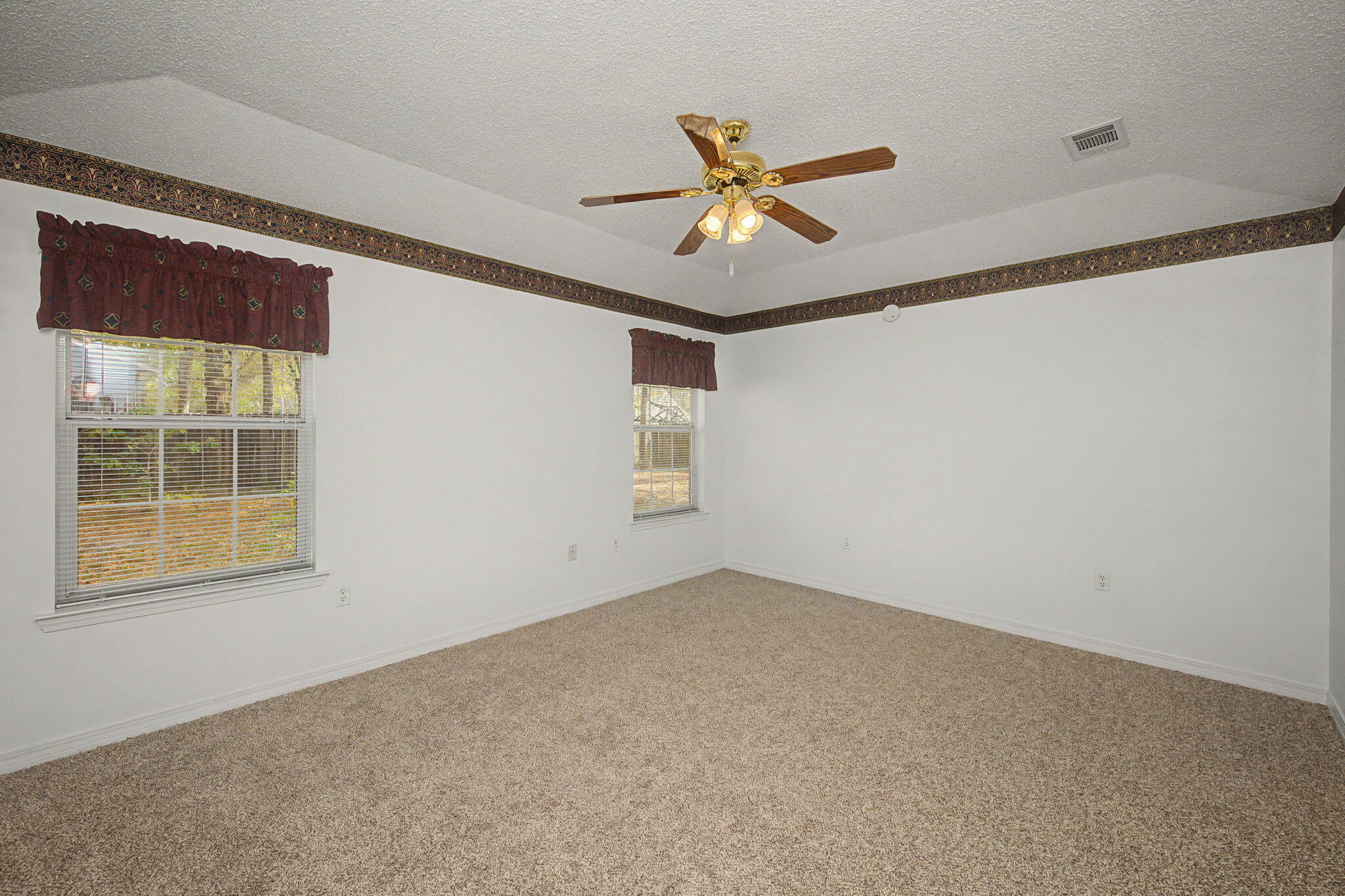 223 Runnymeade Drive Crestview, FL 32539 - Photo 24 of 38 a view of an empty room with a window