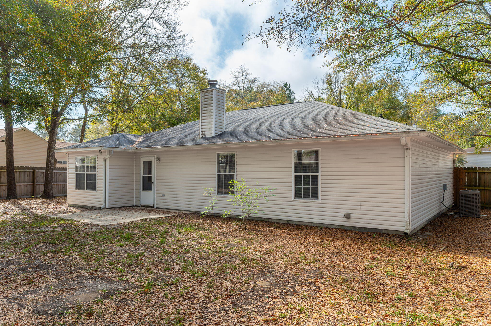 223 Runnymeade Drive Crestview, FL 32539 - Photo 38 of 38 a house with trees in the background