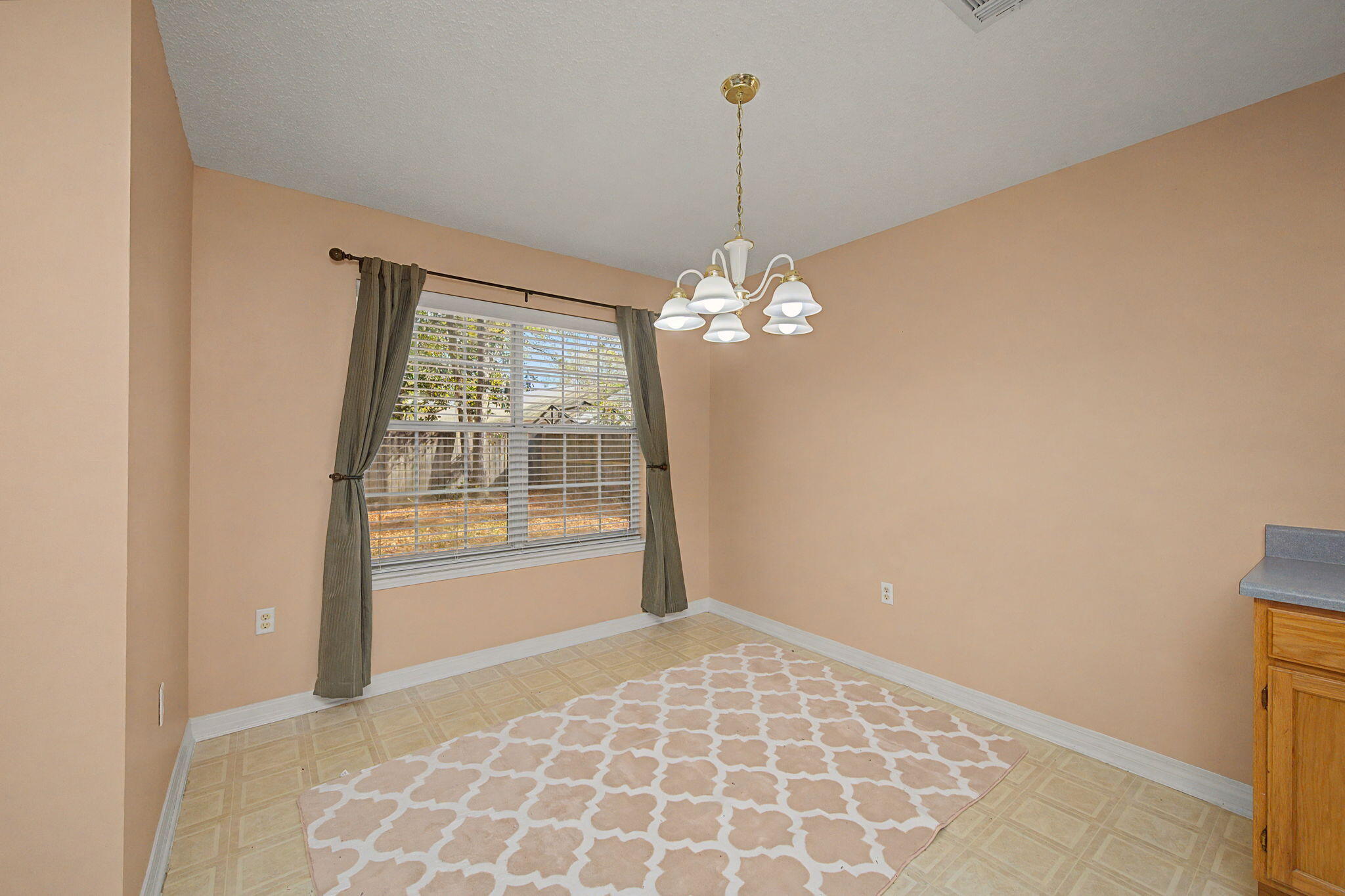 223 Runnymeade Drive Crestview, FL 32539 - Photo 9 of 38 a view of an empty room with a window