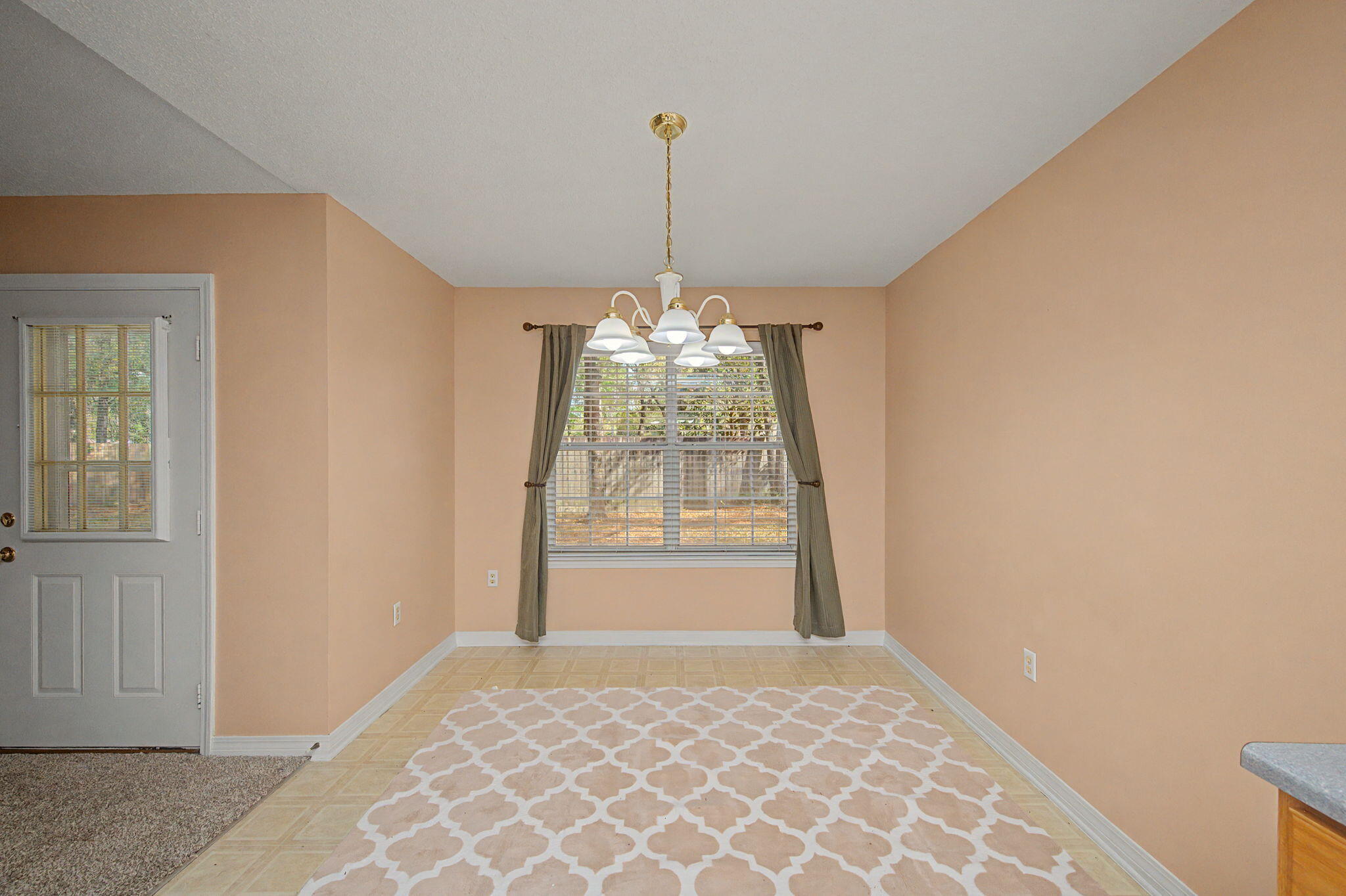 223 Runnymeade Drive Crestview, FL 32539 - Photo 10 of 38 a room with window and stairs