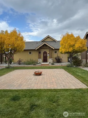 a view of a lake in middle of forest