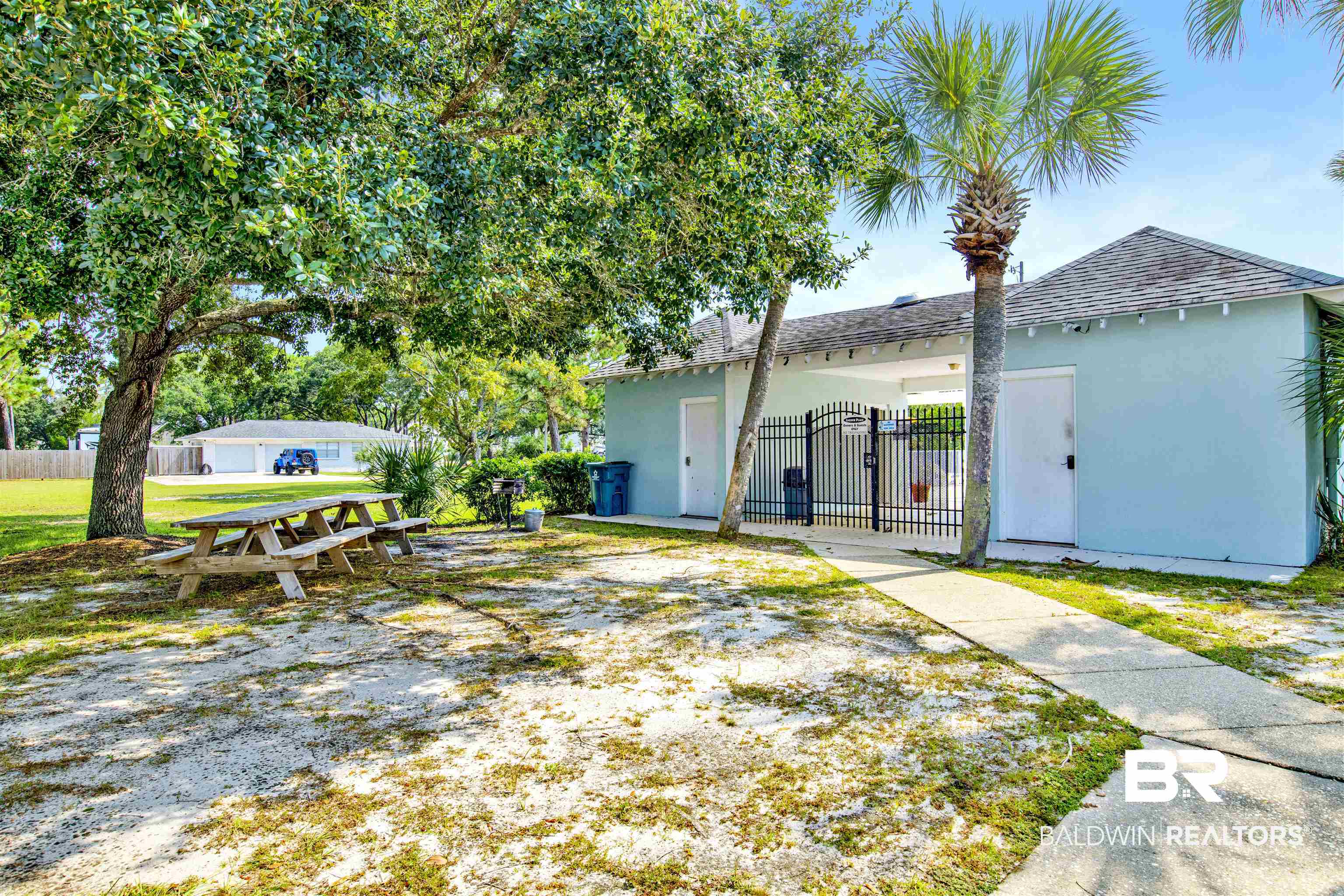 24384 Sailfish Lane Orange Beach, AL 36561 - Photo 23 of 23 Back of house with a yard