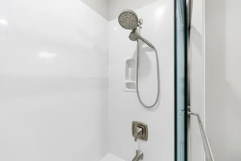 a view of a mirror in a bathroom