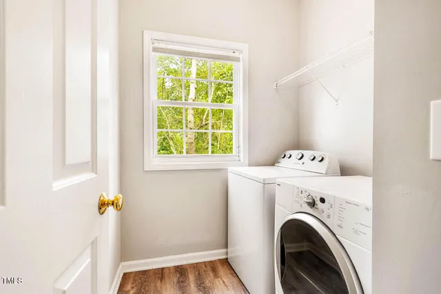 a view of hallway with washer and dryer