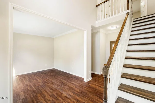a view of entryway with wooden floor