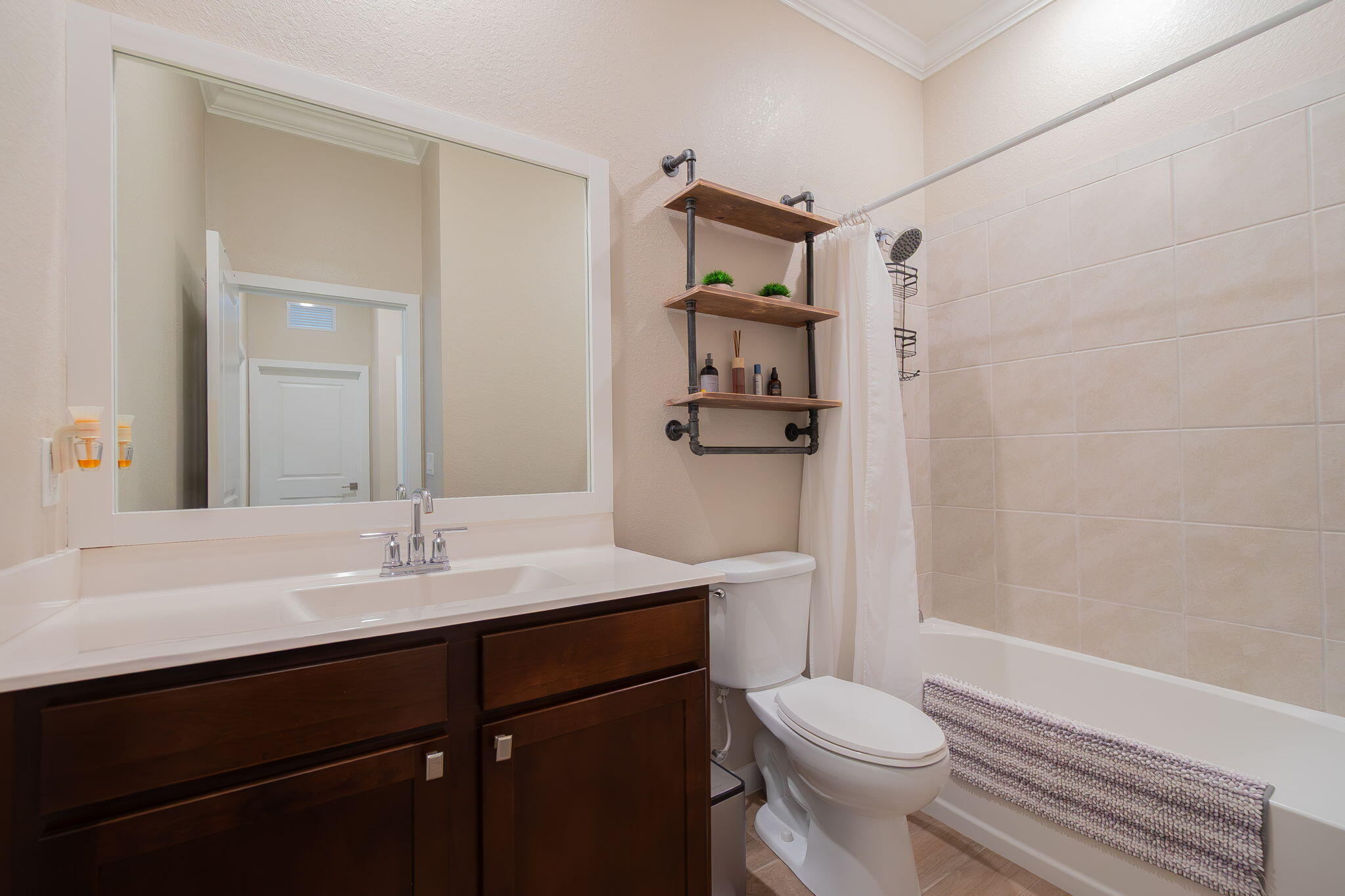 19546 Weathervane Way Loxahatchee, FL 33470 - Photo 12 of 63 a bathroom with a sink toilet and shower