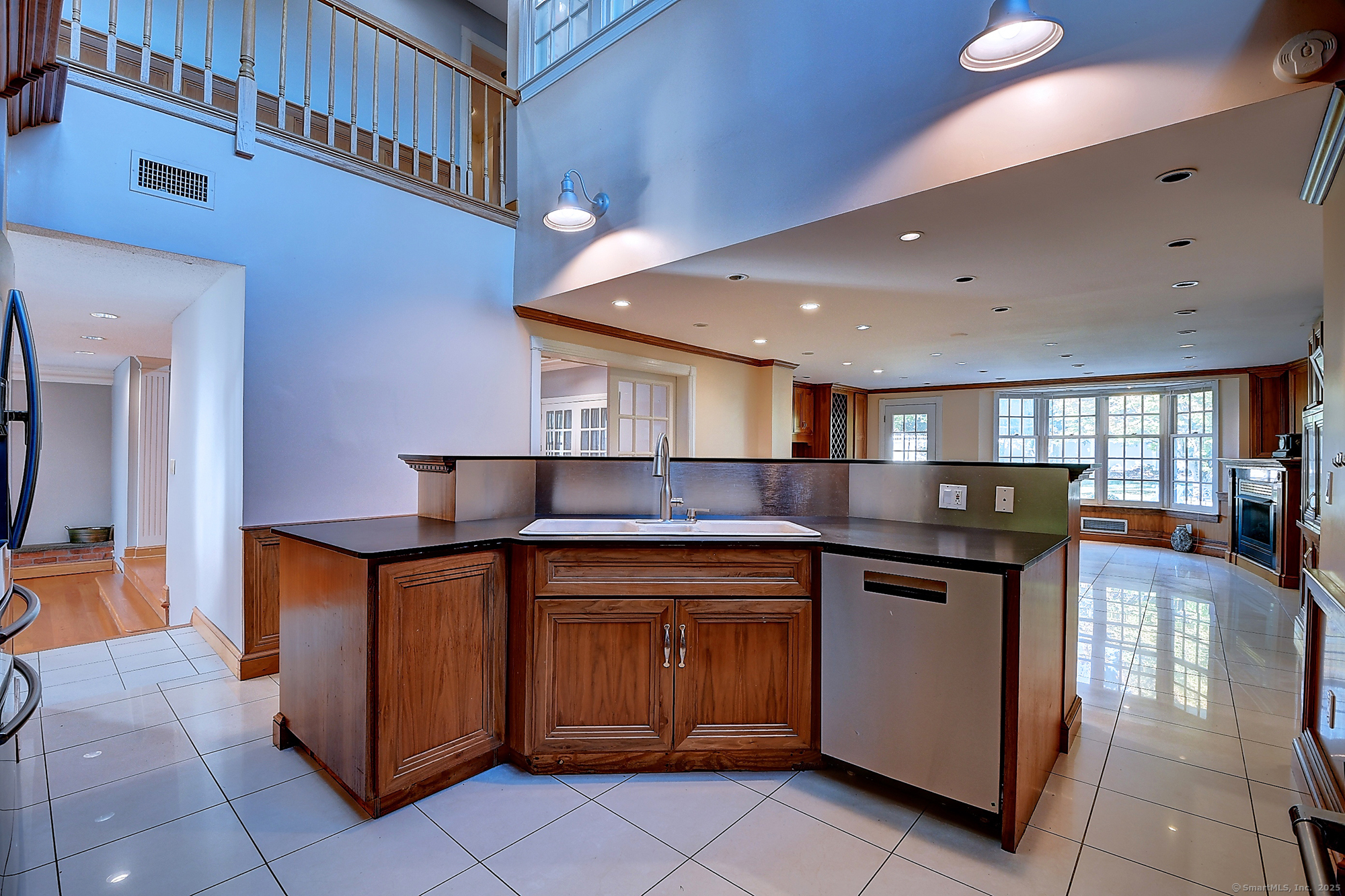 615 Ridge Road Wethersfield, CT 06109 - Photo 11 of 40 a kitchen with a sink and cabinets