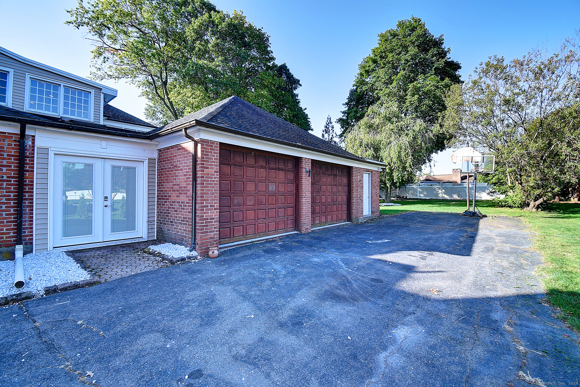 615 Ridge Road Wethersfield, CT 06109 - Photo 26 of 40 a view of a yard with a garage