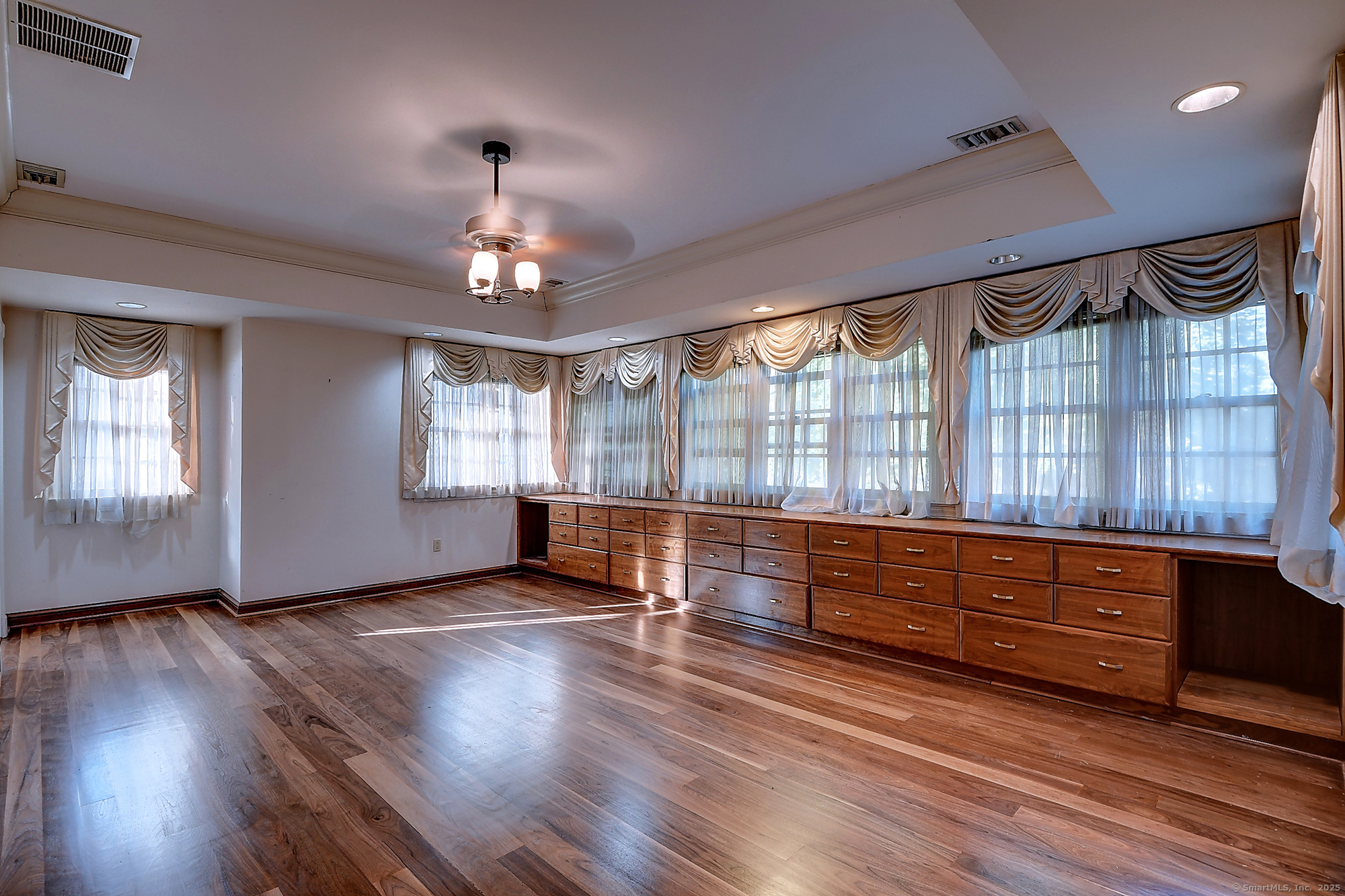 615 Ridge Road Wethersfield, CT 06109 - Photo 28 of 40 wooden floor in an empty room with a window