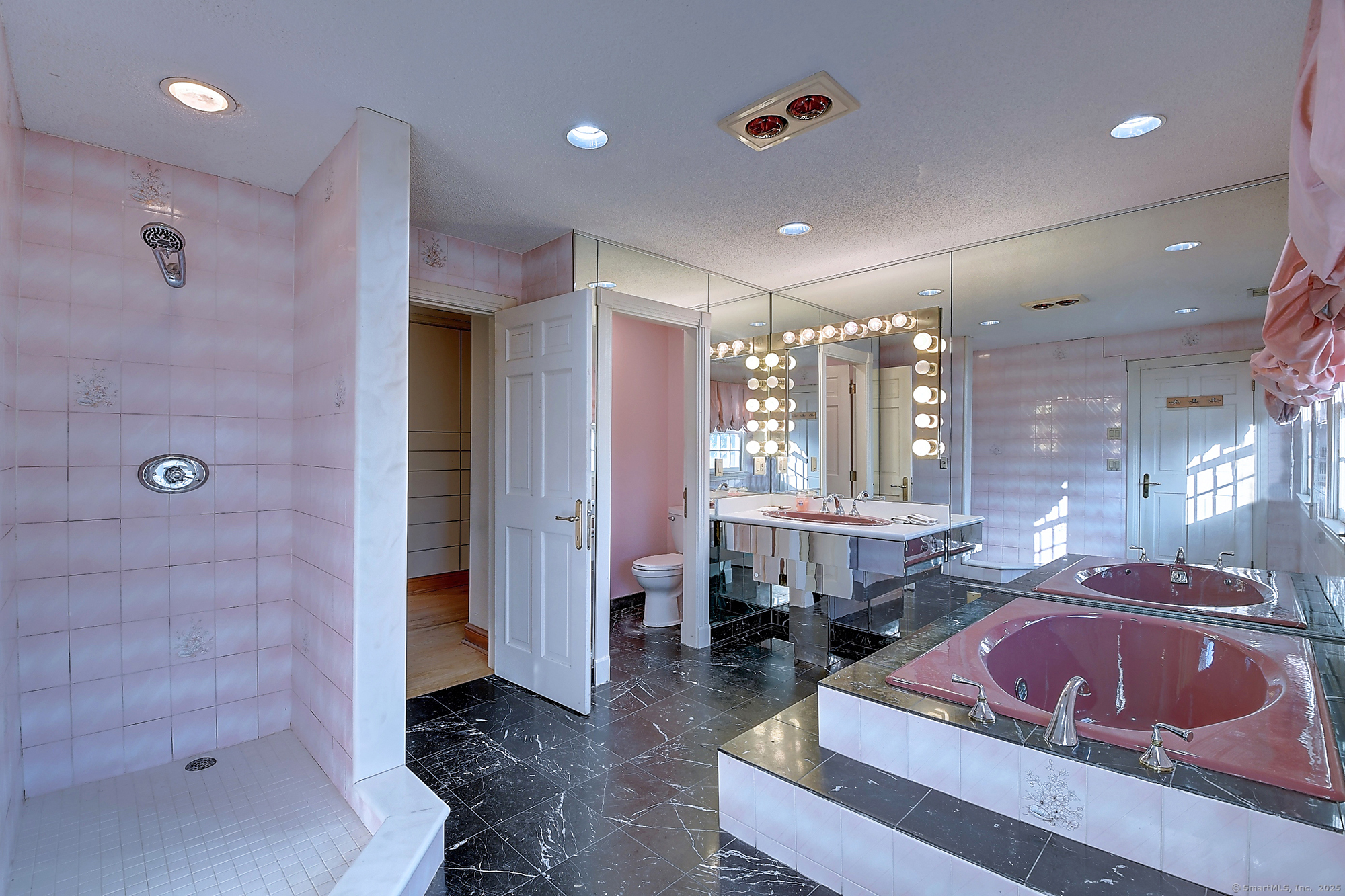 615 Ridge Road Wethersfield, CT 06109 - Photo 29 of 40 a bathroom with a tub a sink and a shower