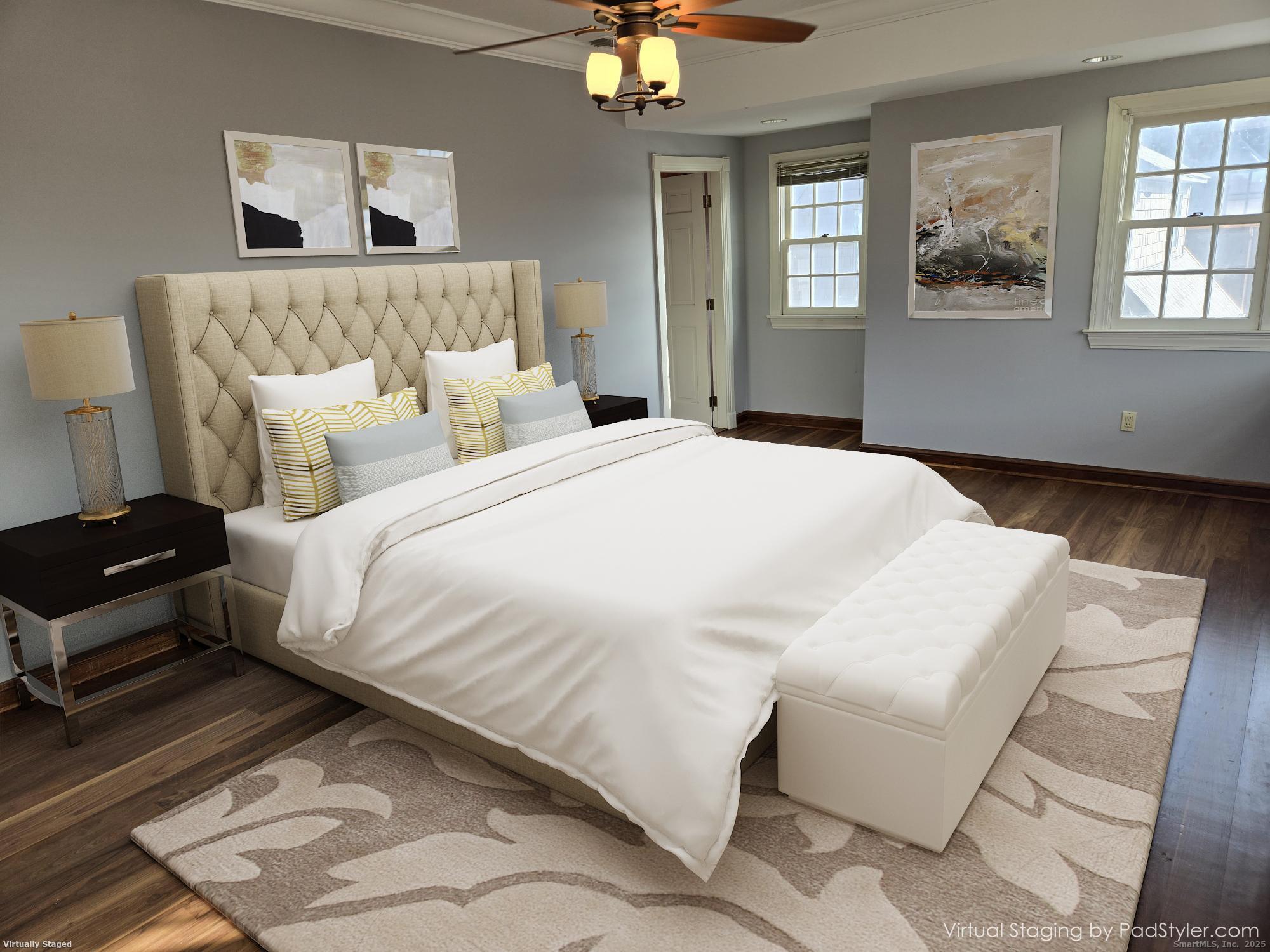 615 Ridge Road Wethersfield, CT 06109 - Photo 34 of 40 a bedroom with a bed and a chandelier