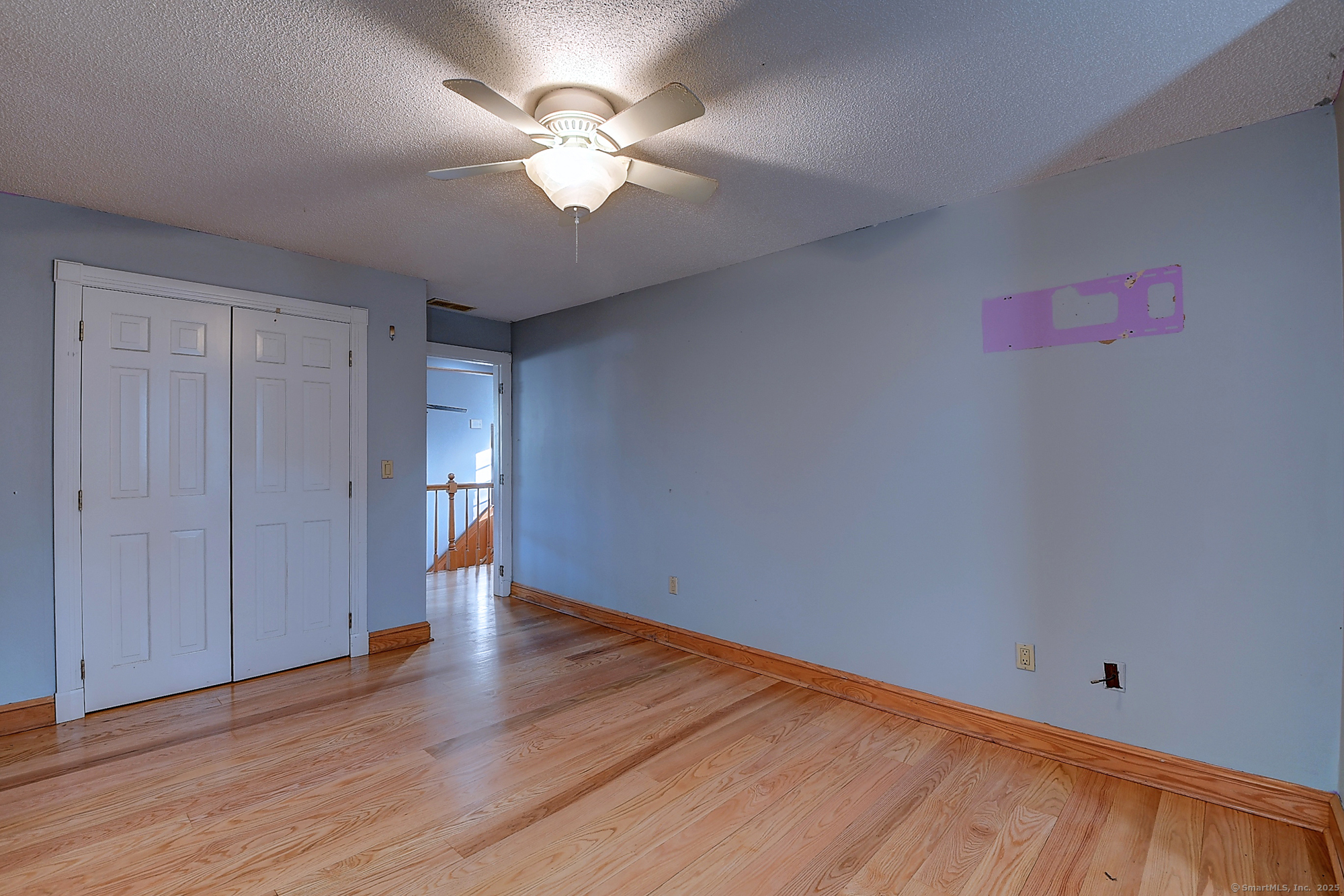 615 Ridge Road Wethersfield, CT 06109 - Photo 38 of 40 a view of an empty room with wooden floor