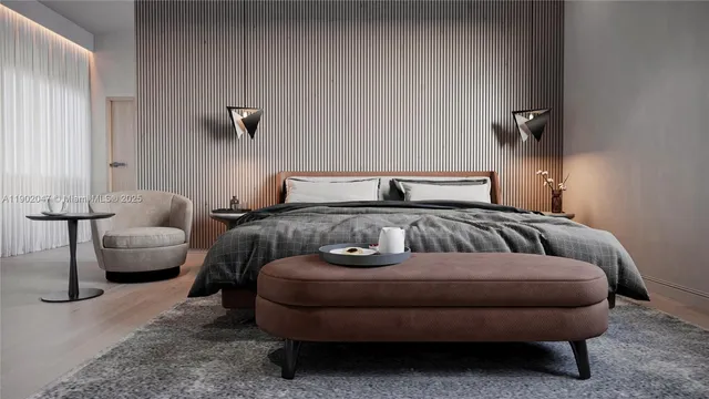 a bedroom with a bed and couch