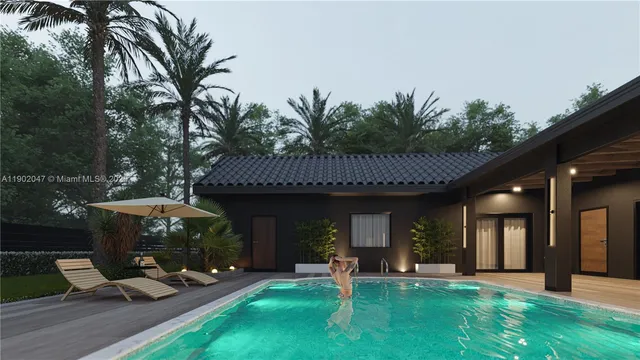 a front view of a house with garden and trees