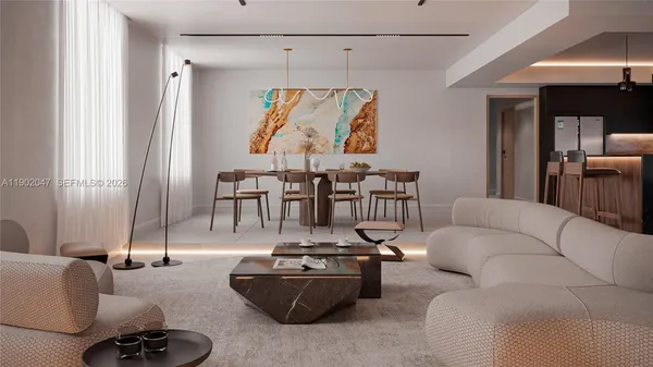 a living room with furniture and a large window