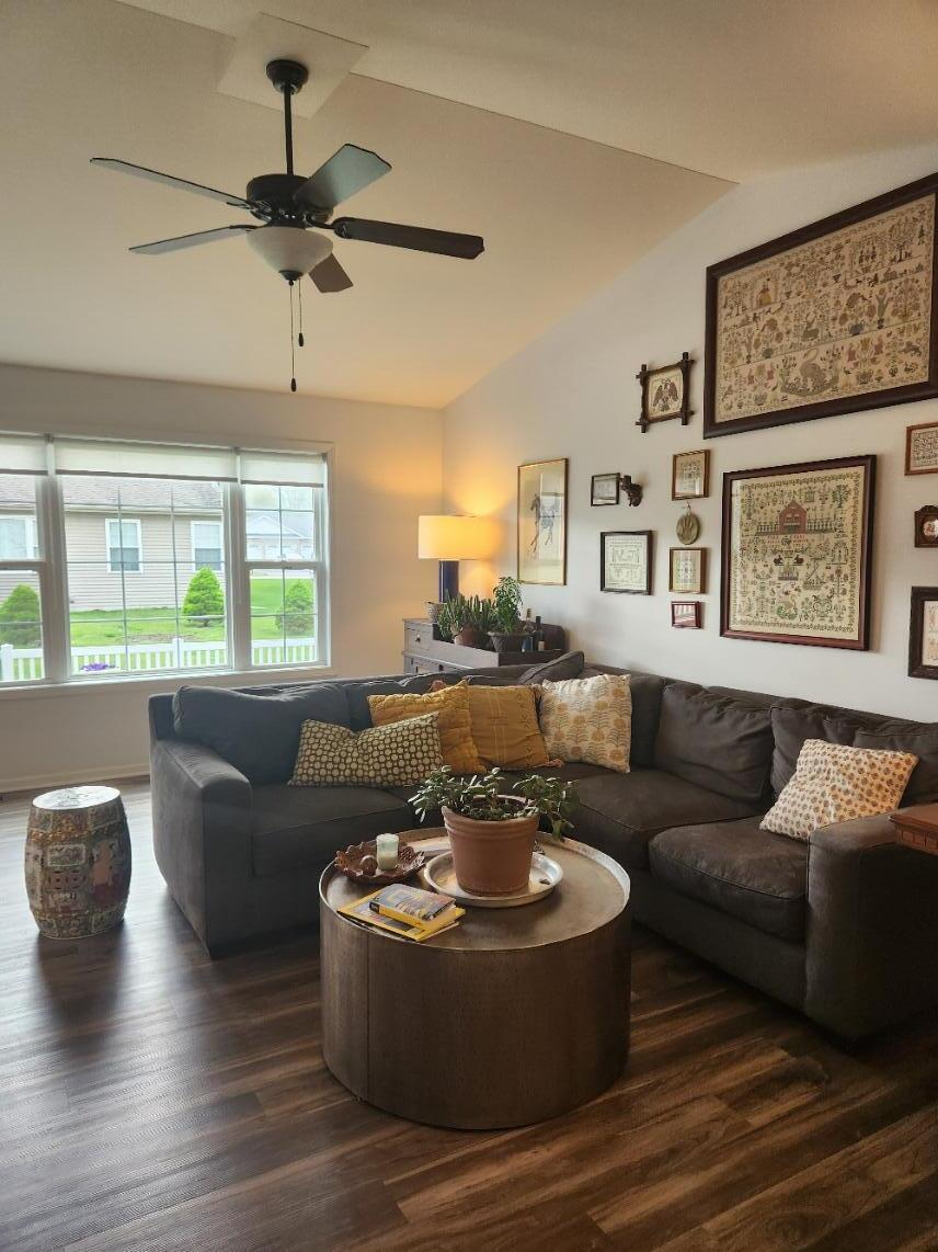 838 Daisy Circle Northeast De Motte, IN 46310 - Photo 11 of 41 a living room with furniture and a large window