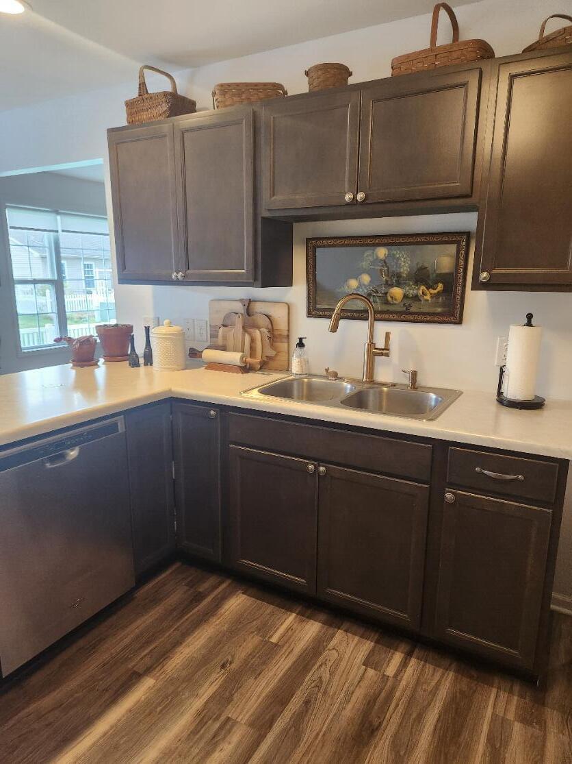 838 Daisy Circle Northeast De Motte, IN 46310 - Photo 16 of 41 a kitchen with a sink and cabinets