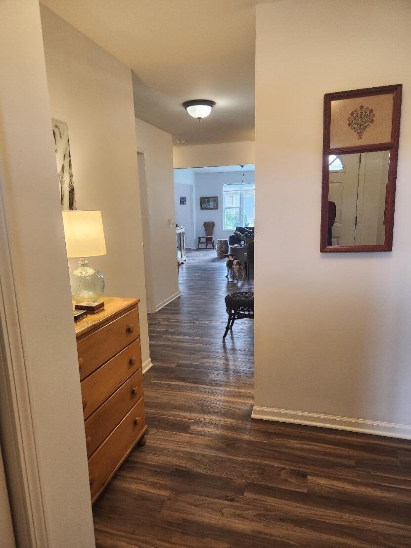 838 Daisy Circle Northeast De Motte, IN 46310 - Photo 2 of 41 a view of kitchen and dining room with wooden floor