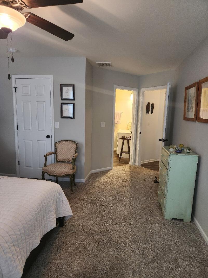 838 Daisy Circle Northeast De Motte, IN 46310 - Photo 24 of 41 a bedroom with a bed and a chair