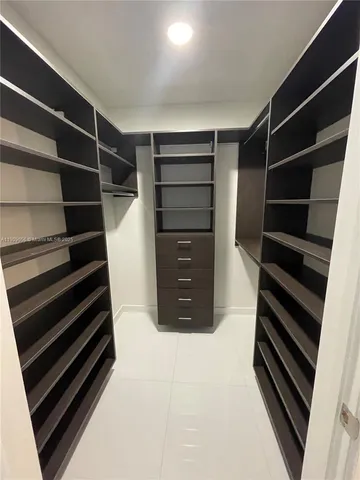 a view of closet with empty racks