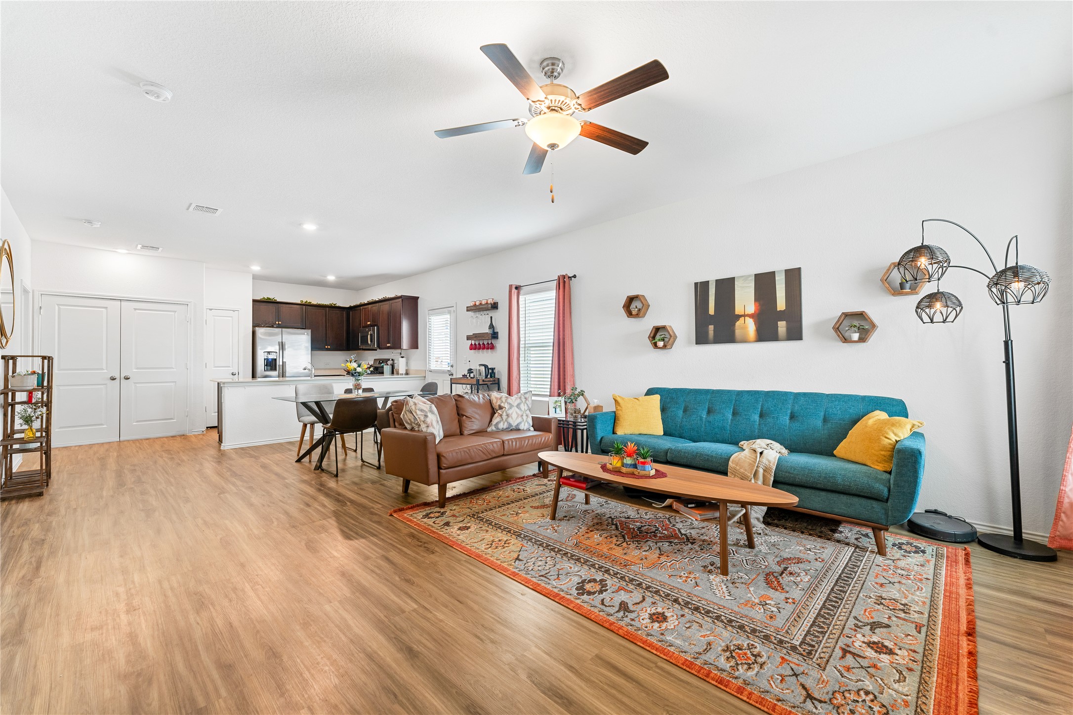 6009 Jagger Avenue Austin, TX 78747 - Photo 7 of 24 a living room with furniture and kitchen view