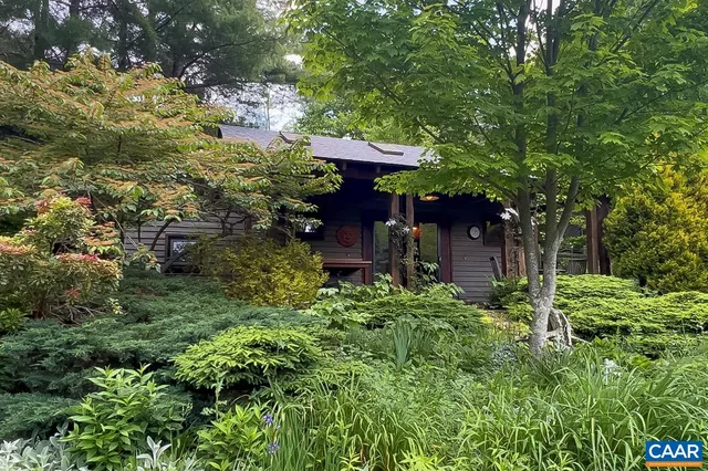 a view of a balcony with wooden floor