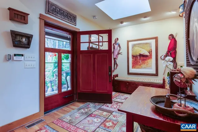 a living room with fireplace furniture and a flat screen tv