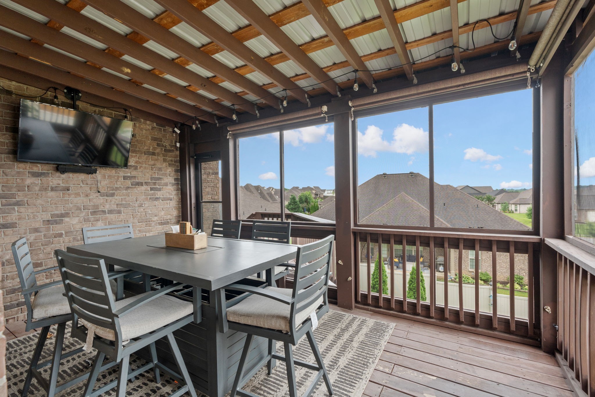2957 Stewart Campbell Pointe Spring Hill, TN 37174 - Photo 23 of 53 a view of a balcony with table and chairs