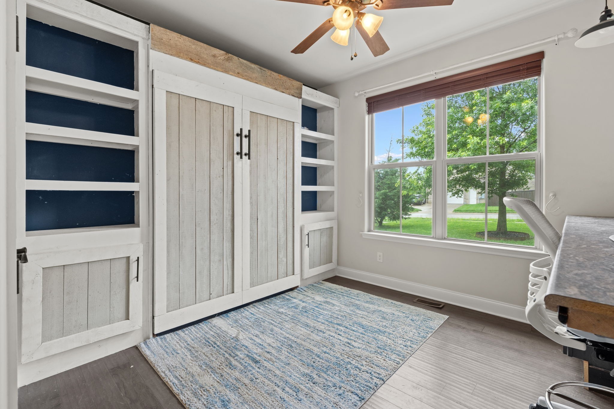 2957 Stewart Campbell Pointe Spring Hill, TN 37174 - Photo 26 of 53 a living room with a large window