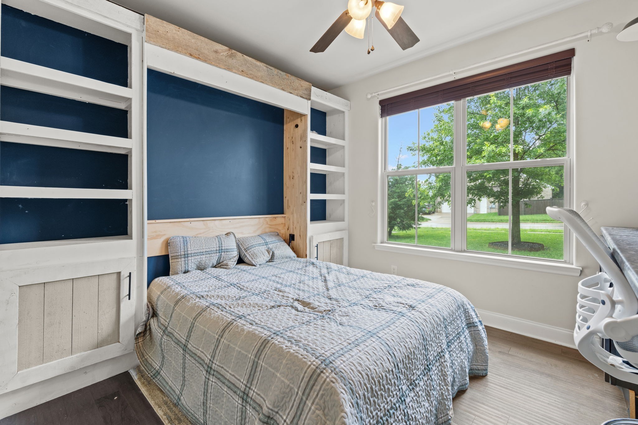 2957 Stewart Campbell Pointe Spring Hill, TN 37174 - Photo 27 of 53 a bedroom with a large bed and a window