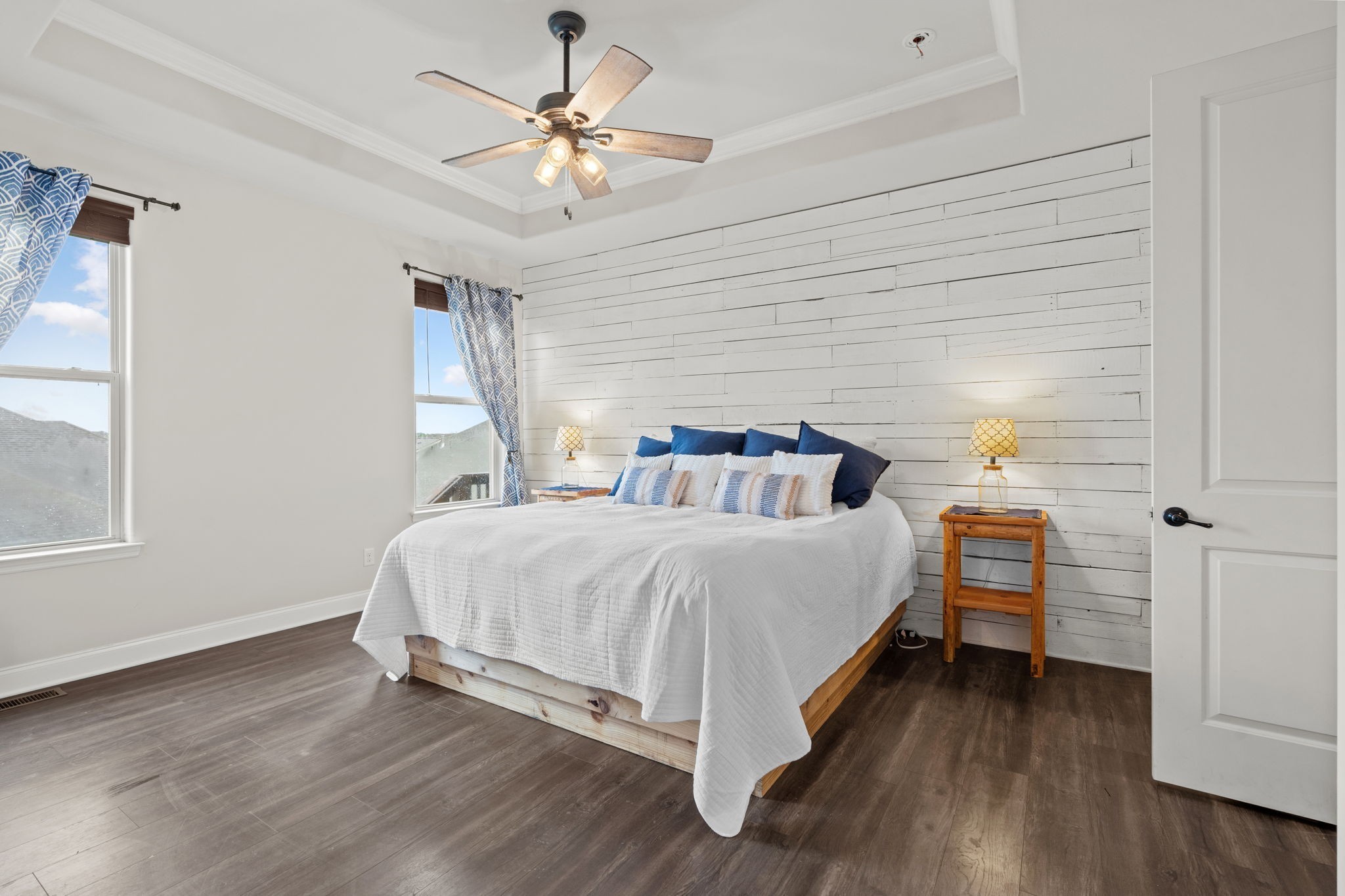 2957 Stewart Campbell Pointe Spring Hill, TN 37174 - Photo 30 of 53 a spacious bedroom with a bed and a chandelier