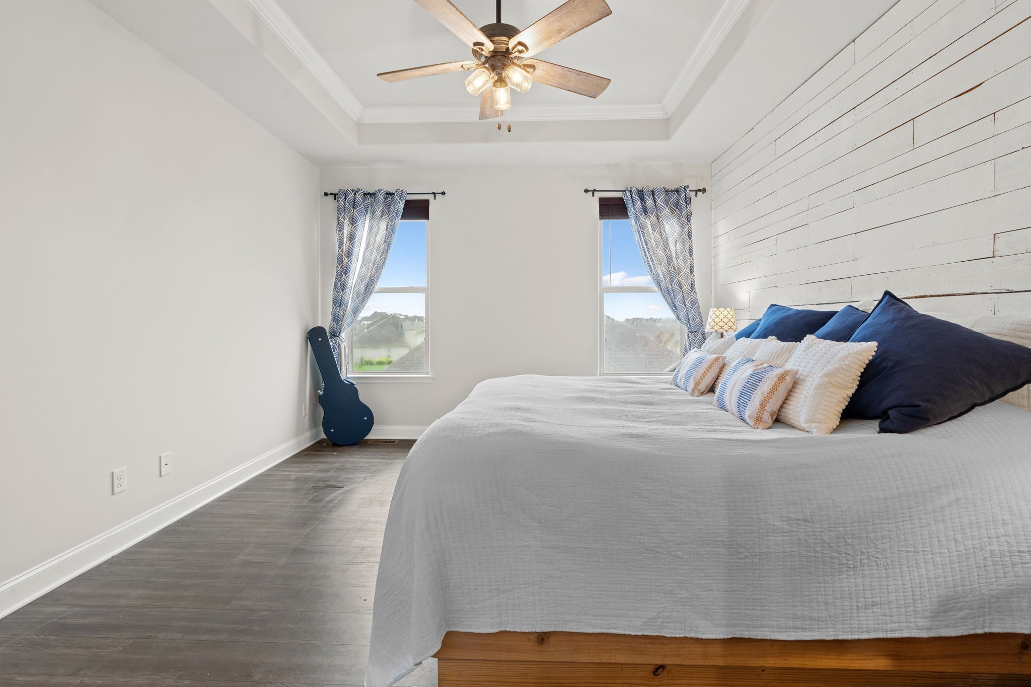 2957 Stewart Campbell Pointe Spring Hill, TN 37174 - Photo 31 of 53 a bedroom with a bed and a chandelier