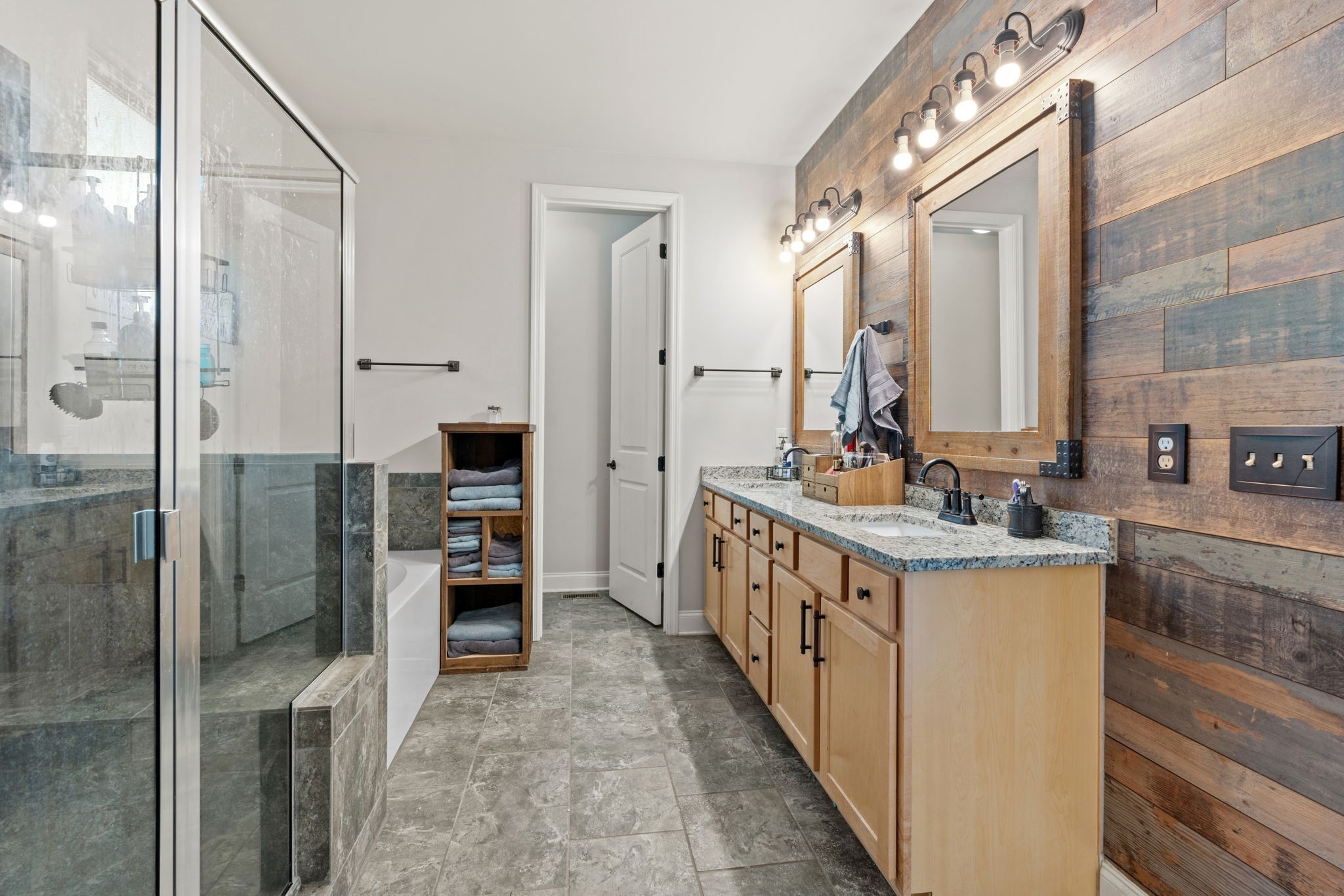 2957 Stewart Campbell Pointe Spring Hill, TN 37174 - Photo 34 of 53 a bathroom with a double vanity sink mirror and shower