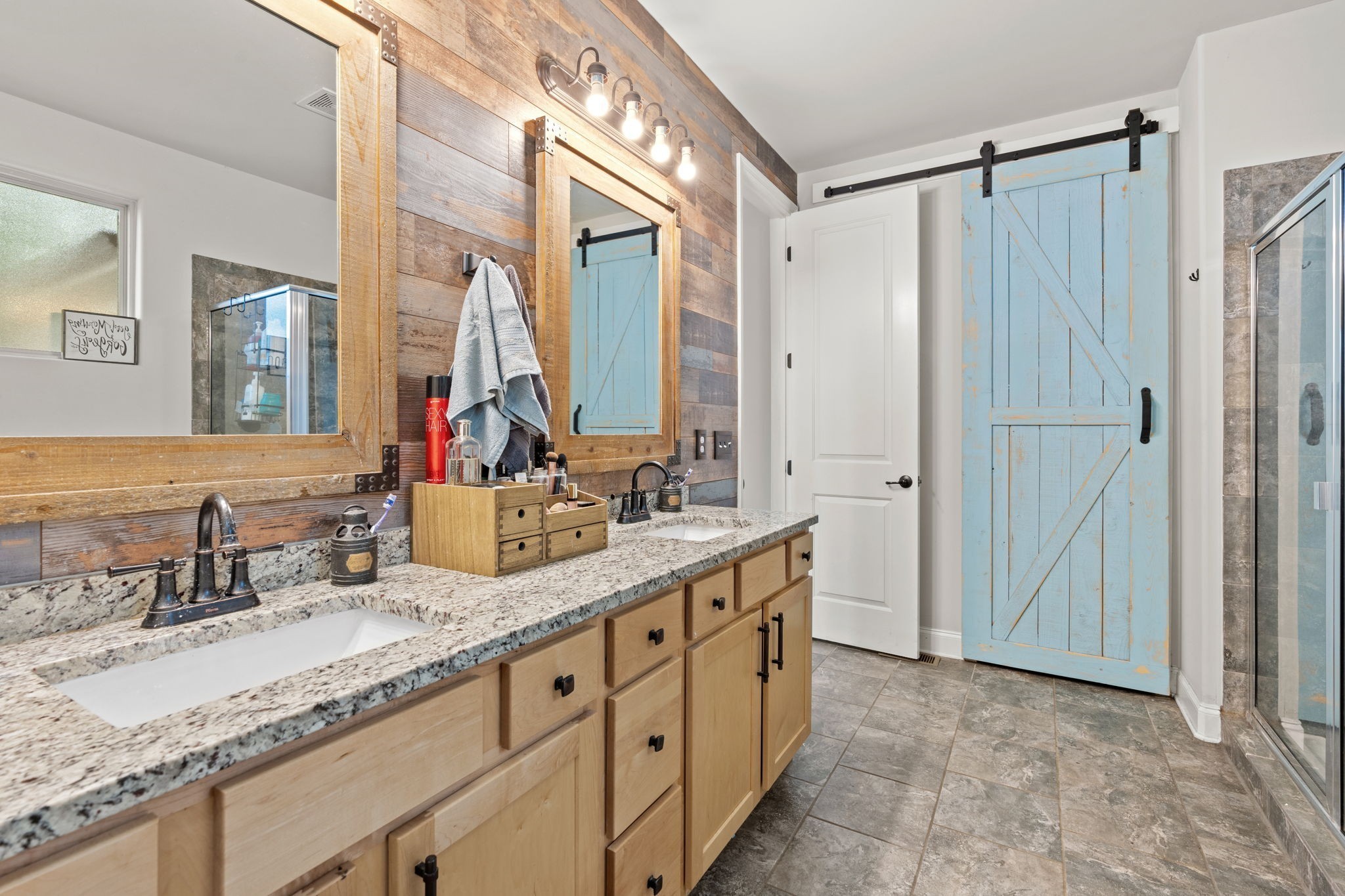 2957 Stewart Campbell Pointe Spring Hill, TN 37174 - Photo 35 of 53 a bathroom with a granite countertop sink mirror and a