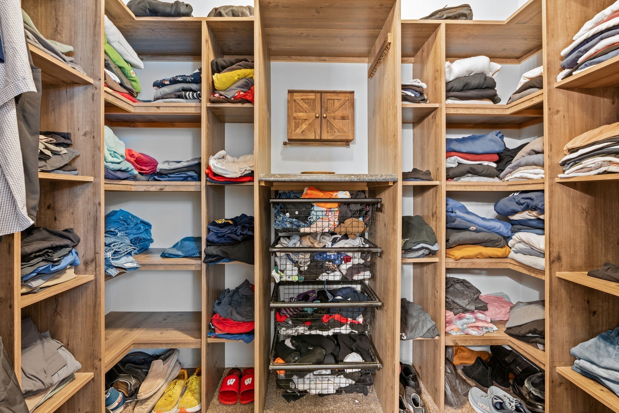 2957 Stewart Campbell Pointe Spring Hill, TN 37174 - Photo 36 of 53 a store room with lots of different colored cloths