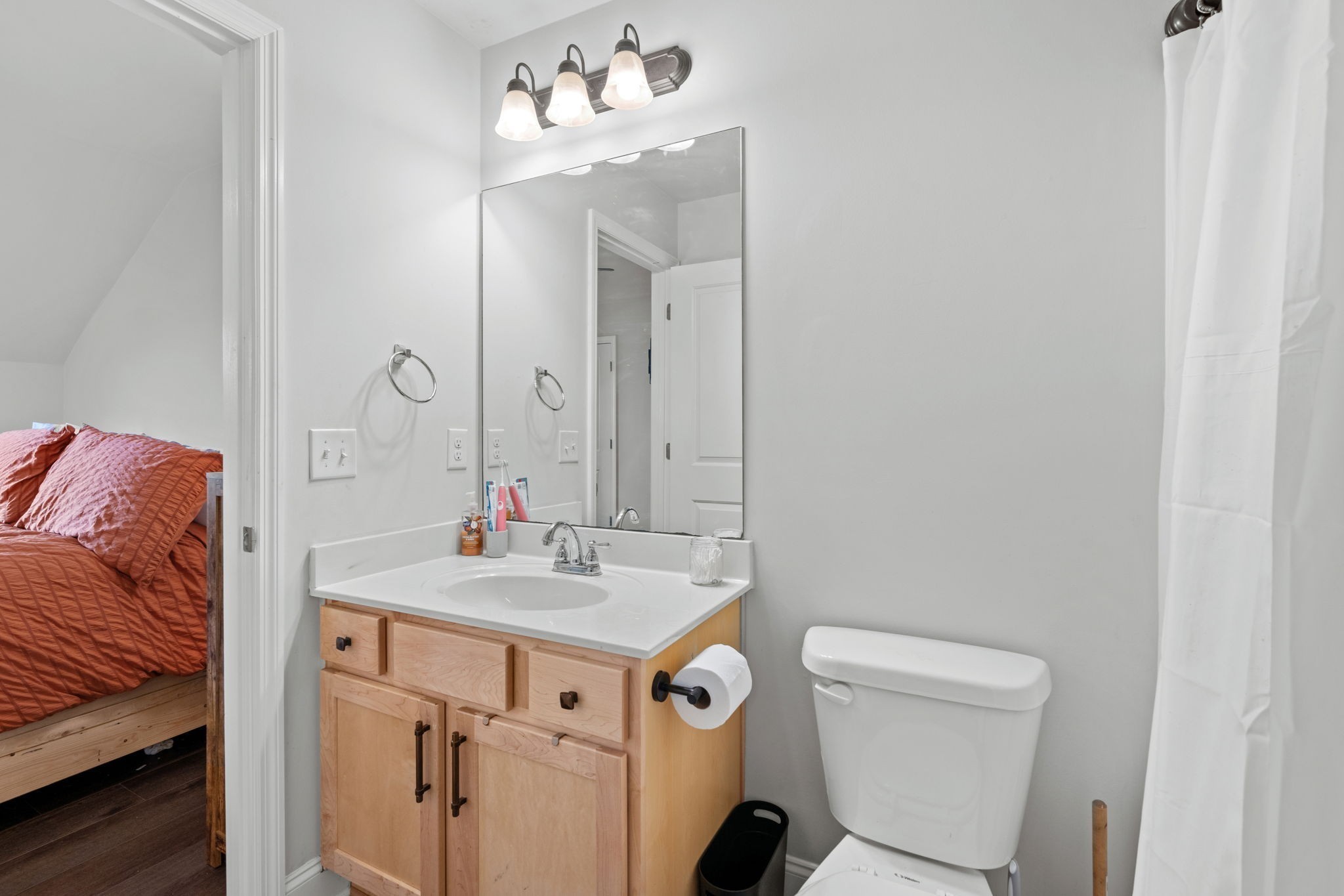 2957 Stewart Campbell Pointe Spring Hill, TN 37174 - Photo 37 of 53 a bathroom with a sink toilet and mirror